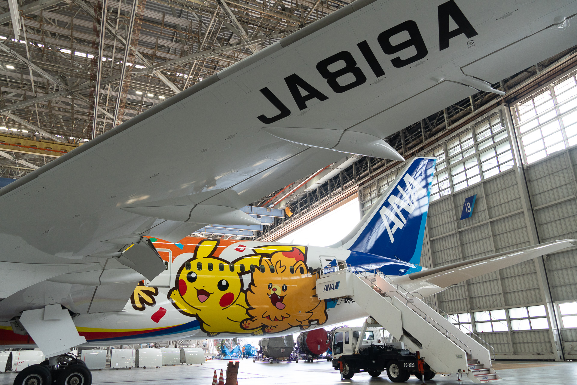 Pomuken, from the new Wind/Wave games, makes an early appearance on the rear left side of the fuselage.
