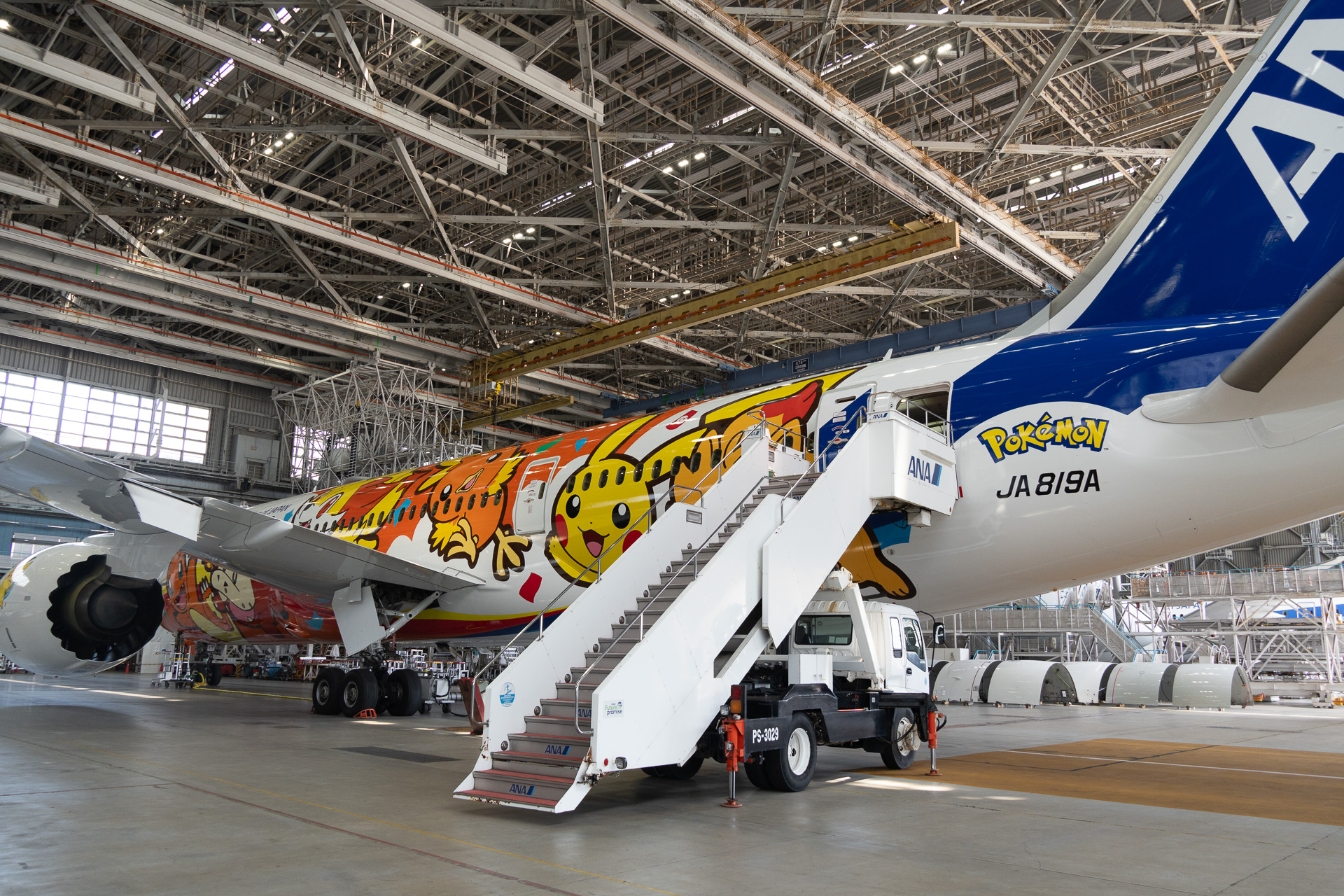Pomuken, from the new Wind/Wave games, makes an early appearance on the rear left side of the fuselage.