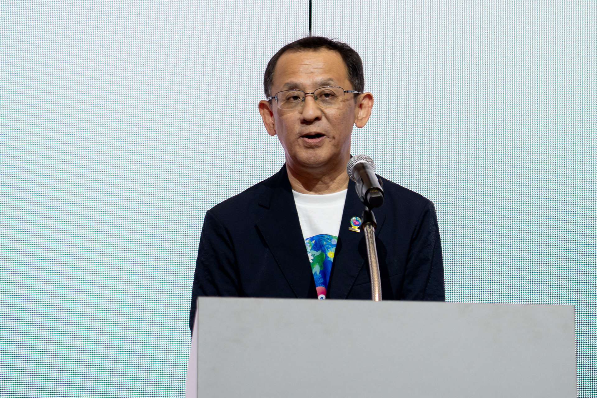 最新情報を発表した、横浜市脱炭素・GREEN×EXPO 推進局担当理事 市川素久氏