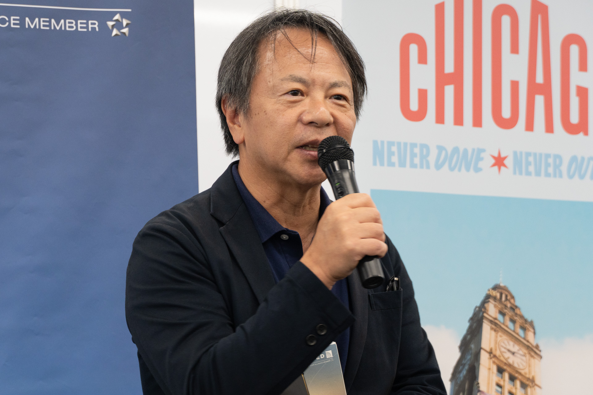 冒頭に登壇したユナイテッド航空 日本地区営業統括本部長 佐久光俊氏