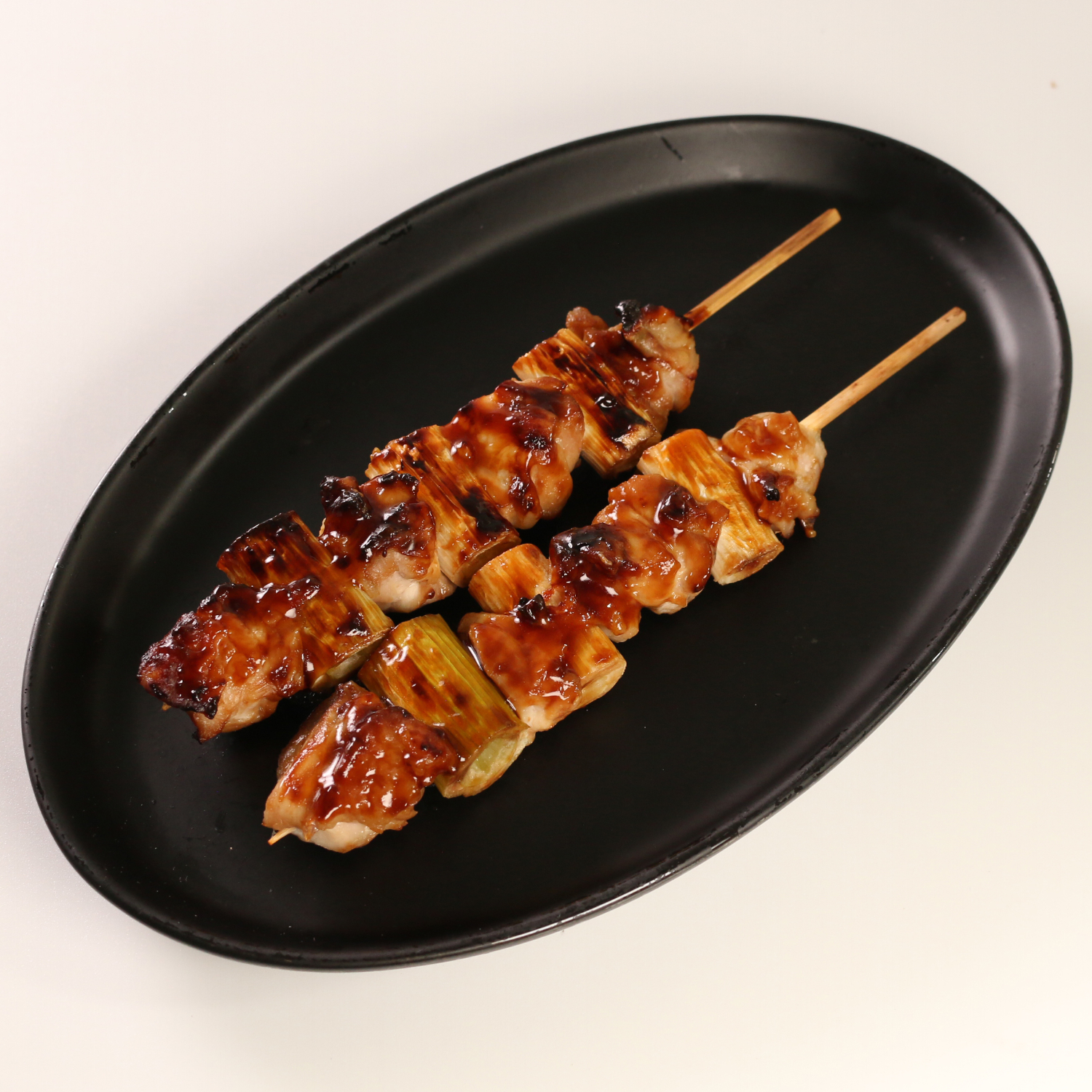 50％増量 国産鶏のもも串/ねぎま串（1本129.60円）