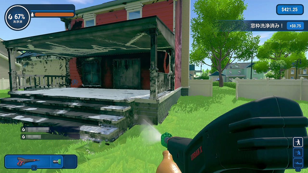 汚れを高圧洗浄機の水を当てて落とす