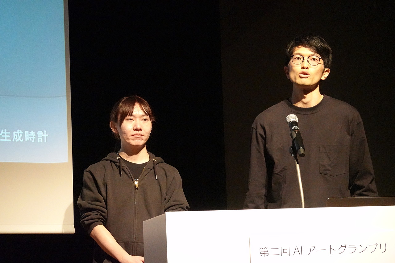 作品を制作したチーム「実験東京」の安野貴博氏と山根有紀也氏。Webサイトは<a href="https://experiment.tokyo/" class="strong b">こちら</a>