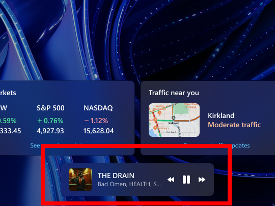 ロック画面の下部中央にメディアコントロールが追加