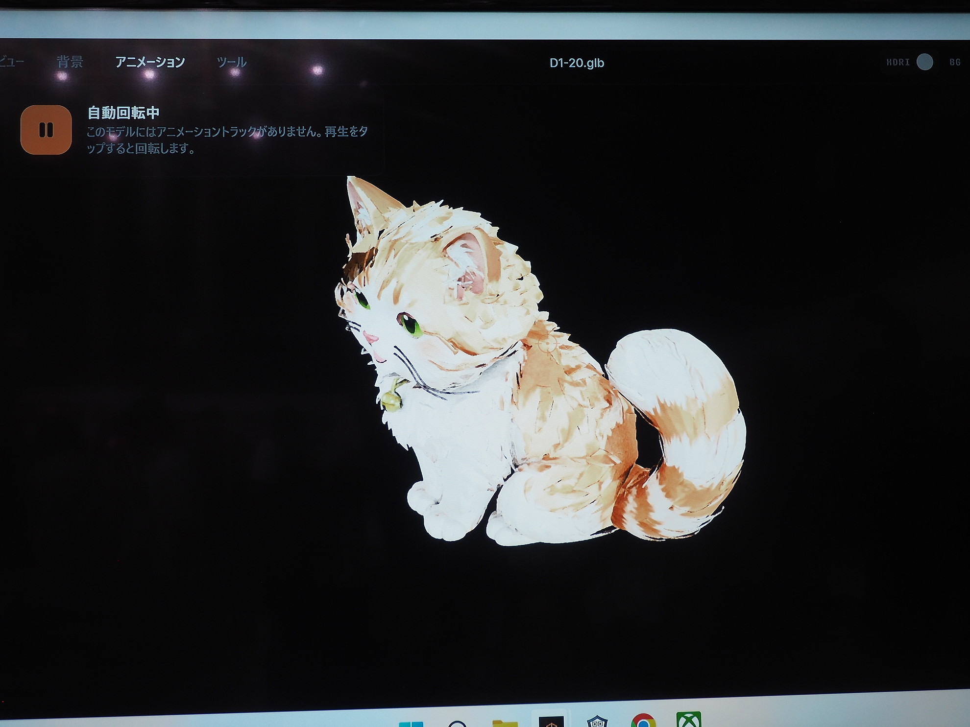 先ほどの猫の2D画像から生成された3Dモデル。完成した3Dモデルは大型モニターの大画面に表示される。3Dモデルと参加者が一緒に記念撮影も可能だった