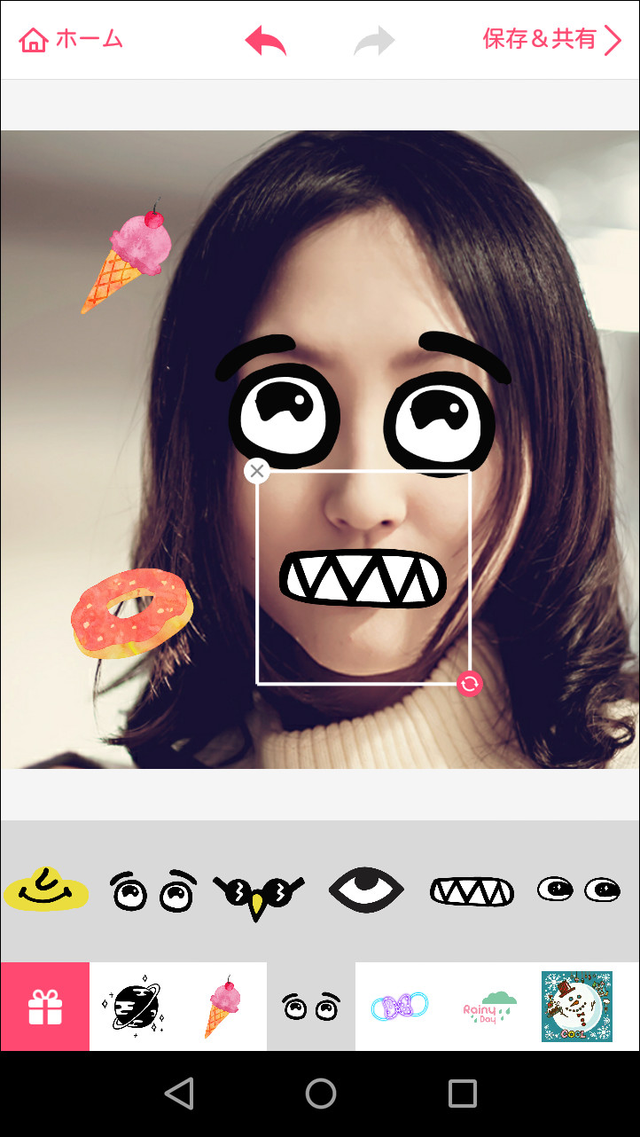 ステッカーを選択して挿入し、ドラッグ操作で移動や拡大・縮小、回転を行える