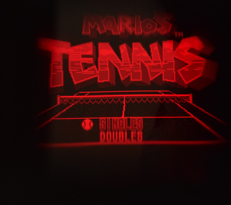 マリオズテニスのキャラクターセレクト画面。マリオ、ピーチなどおなじみのキャラクターが並ぶ